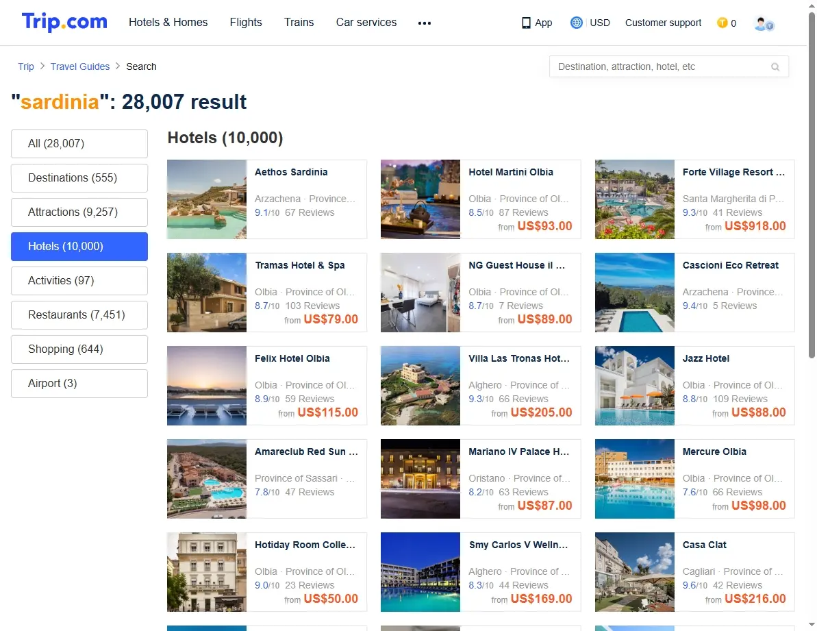 A beautiful hotel swimming pool overlooking the Sardinian coast, suggesting available accommodations.