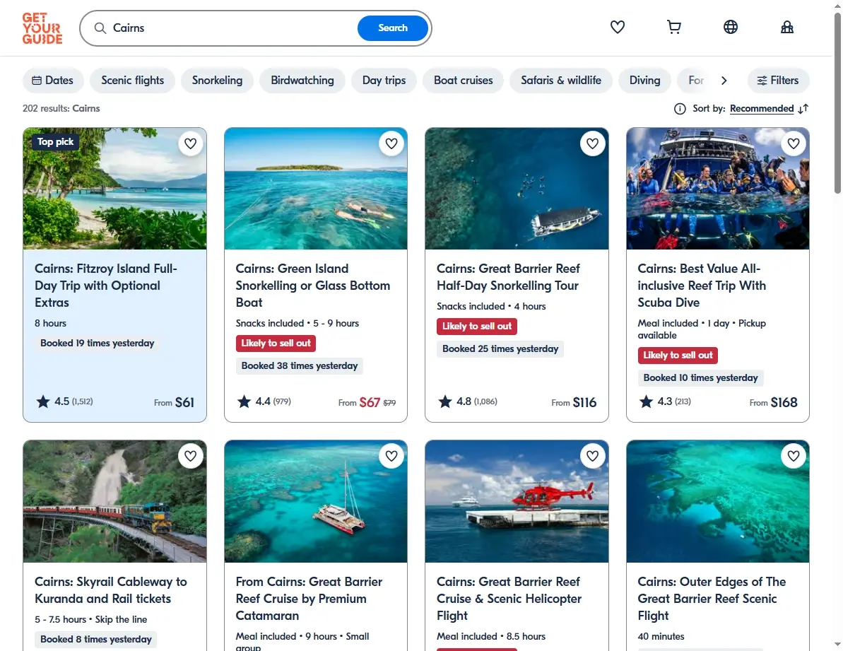 Screenshot of Cairns activities and tours on GetYourGuide, showing snorkeling and rainforest options