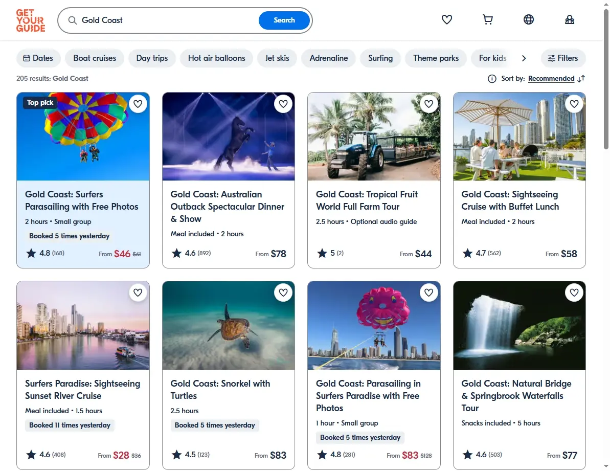 Screenshot of an activity booking website featuring theme parks, boat tours, and Gold Coast experiences.